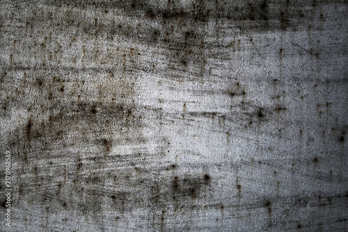 Grunge metal texture background with rust, scratches and corrosion. Weathered steel surface featuring industrial wear, distressed metallic details and aged iron texture for design projects.