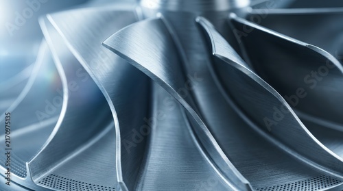 Industrial additive technologies concept featuring a 3D printed turbine propeller with steel blades.