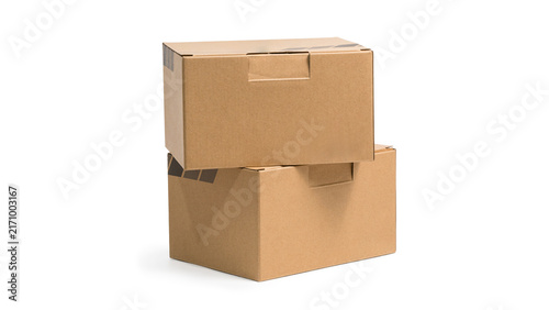 Stacked brown cardboard delivery boxes with top open box isolated on white background