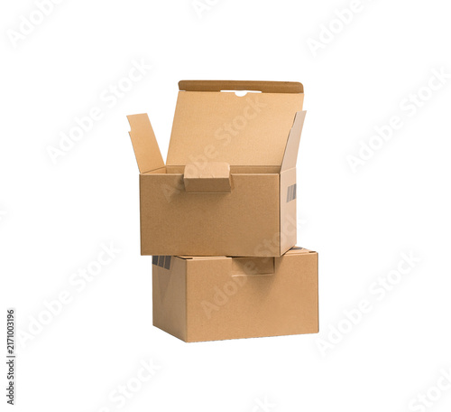 Stacked brown cardboard delivery boxes with top open box isolated on white background