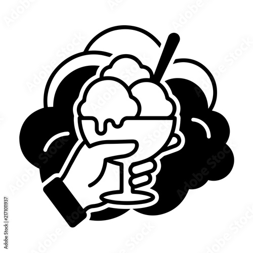 Simple solid icon of a hand holding an ice cream sundae glass with sweet treat