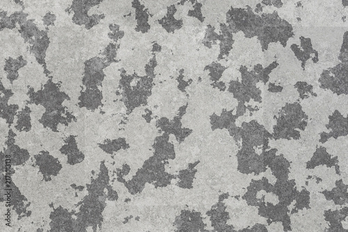 Light grey weathered concrete texture background with chipped paint