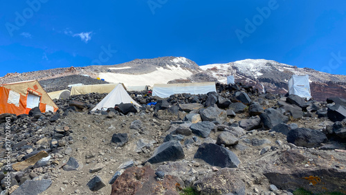 Photography Camp sanitation supports climbers, ground-level view of temporary toilets and sh