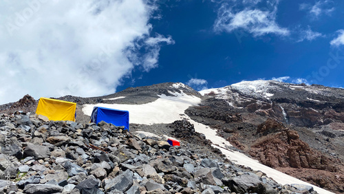 Fotografie High camp staging in low angle view on Mount Ararat, with temporary shelters amo