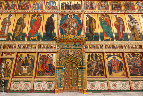 View of the ornate iconostasis at Solovetsky Monastery featuring detailed religious paintings and gold leaf decorations in Solovetsky, Arkhangelsk Oblast, Russia.