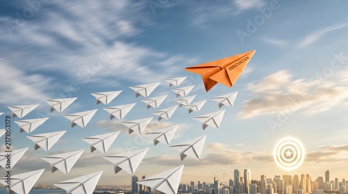 Orange paper airplane leads a group of white paper airplanes in the sky