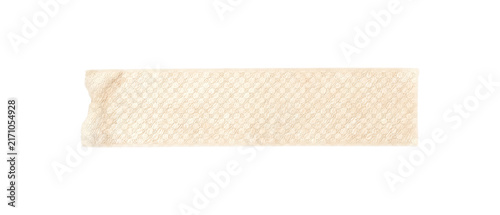 Cream textured woven fabric masking tape with subtle pattern and frayed edge