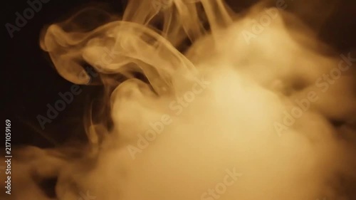 Close-up of swirling smoke clouds in dark setting