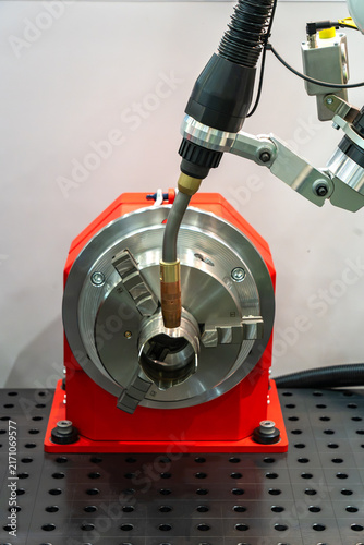 Fotografie Industrial CNC machining setup with precision tool head, metal component and rot