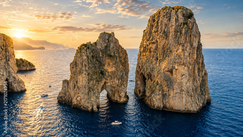 Aerial View of Faraglioni Sea Stacks and Mediterranean Coast of Capri, Italy at Golden Hour