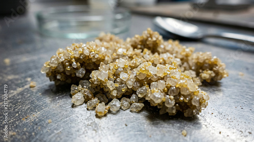 Raw Synthetic Mineral Crystals on Lab Work Surface Close Up