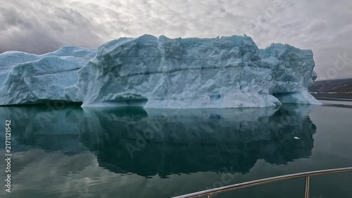 Floating iceberg in the Nuuk fjords, Greenland. Melting ice as result of global warming and climate change.