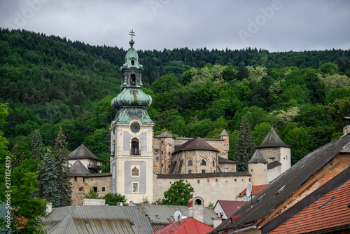 Photography Green onion dome and stone turrets of the Old Castle in Banska Stiavnica, Slovak