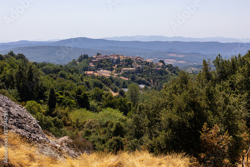 August, 14, 2026. View of Monterotondo Marittimo surrounded by the Tuscan countryside, photographed from the geothermal landscape of Le Biancane in southern Tuscany, Italy.