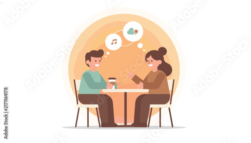 Happy young couple sitting at a cafe table, drinking coffee and talking about music and creative dreams together.