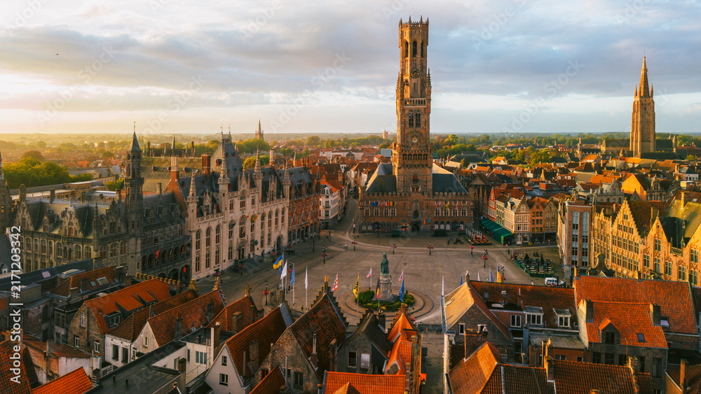 Obraz premium Aerial view of Bruges old town and market square during sunrise Belgium