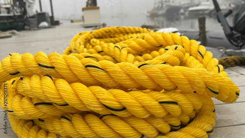 Coiled Yellow Rope On Dock Up Close