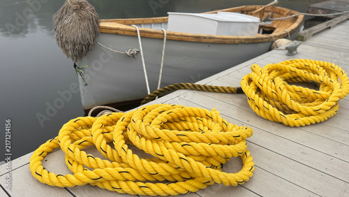 Bright Yellow Coils of Rope and Dockside Dinghy 