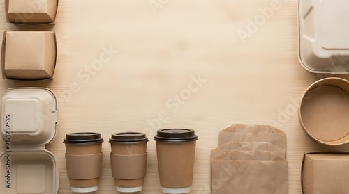 A Comprehensive and Eco-Friendly Collection of Disposable Food Packaging for Takeaway and Fast Food. The set includes cardboard boxes cups bowls and paper bags all designed for one-time use and made