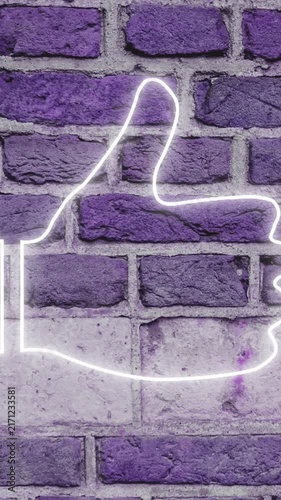 Thumbs down neon sign on brick wall 4k