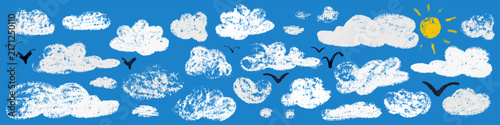 Crayon doodle clouds set with yellow sun and flying birds on blue background. Playful hand drawn wax pastel and chalk sky elements collection for kids design, nursery decor. Vector illustration