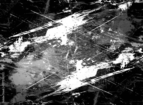 Monochromatic grunge background with heavy black and white scratches and distressed paint