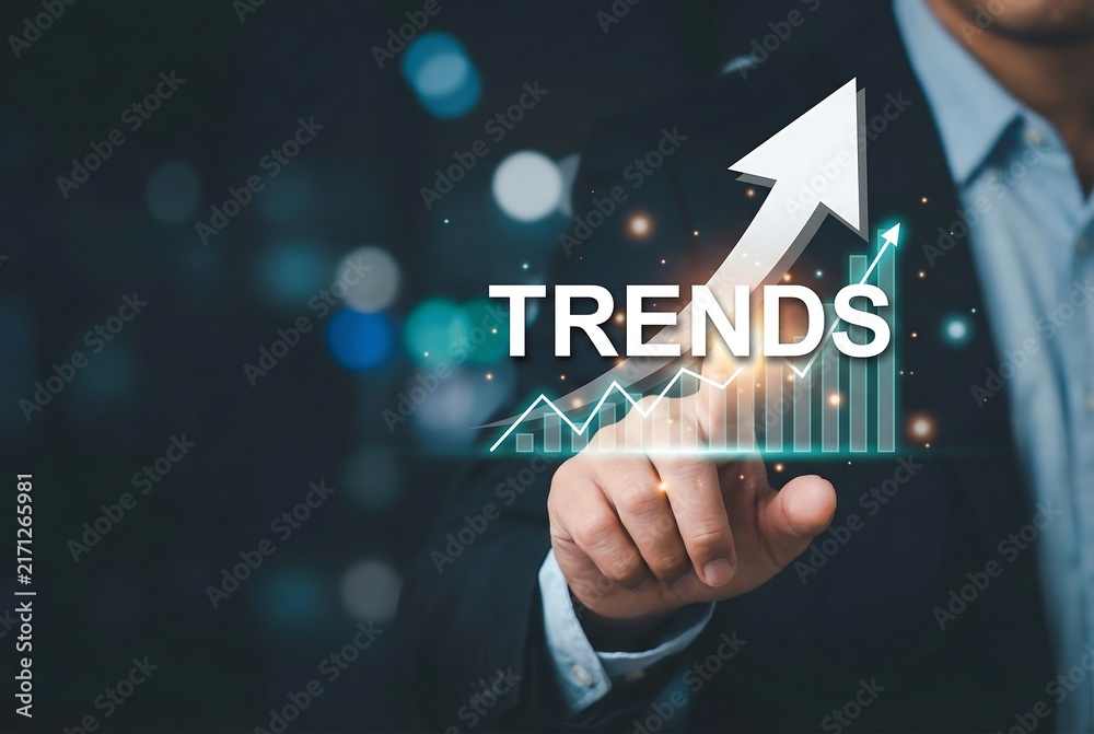 Obraz premium Business analyst touching glowing digital trends chart with upward arrow indicating growth