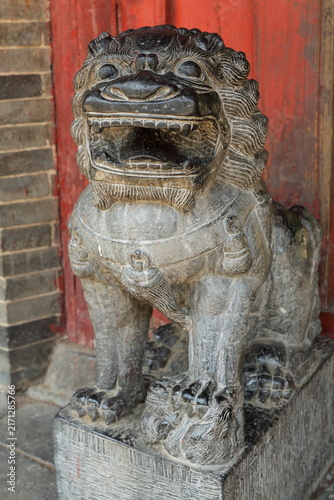 Traditional Stone Guardian Lion at Songyang Academy in China