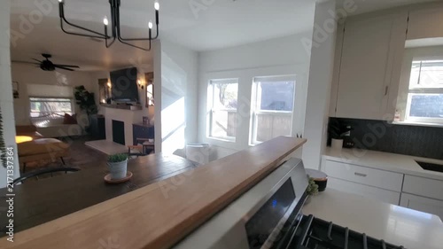 Bright modern kitchen and living area in open-plan home