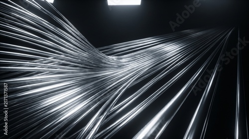 Abstract silver lines creating a wave effect in a dark space  