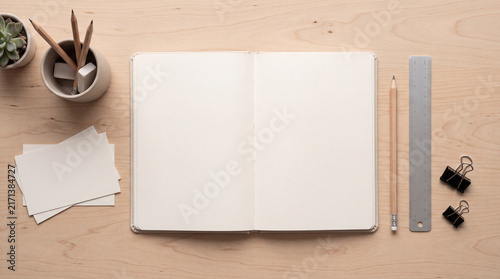 Minimal Analog Planning Workspace with Blank Open Notebook