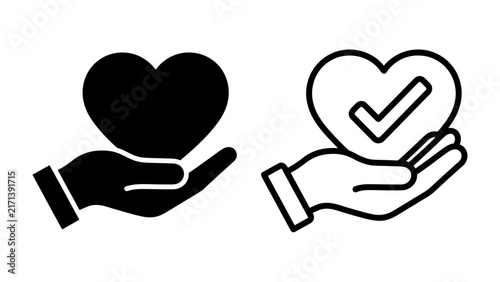 Bild auf Leinwand Hand holding Heart symbol and check mark symbol