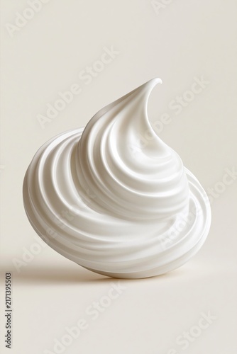 White whipped cream dollop swirl on a simple soft beige background studio
