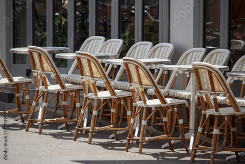 Bild auf Leinwand Parisian Street Cafe Brasserie Bistro Tables and Chairs Closeup