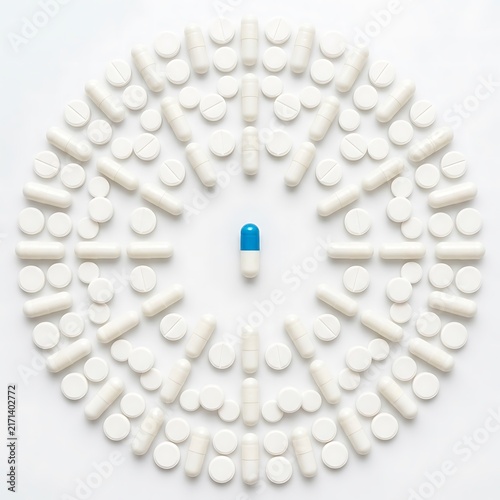 White Blue Pill Among White Pills Top View