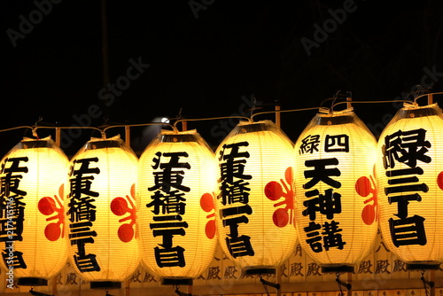 Kento Myo: Traditional Japanese summer lanterns glowing at a shrine at night / 日本の夏の伝統行事 献灯明 神社の夜に連なる提灯の幻想的な風景