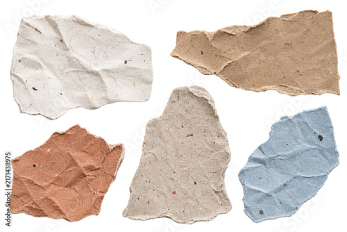 Collection of textured handmade paper pieces in various colors including white, beige, brown, terracotta, and blue arranged on a white background for artistic use