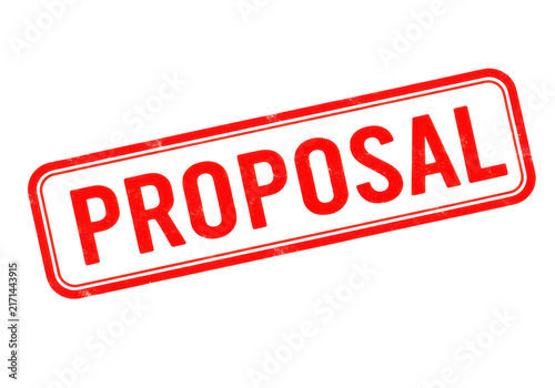 Red proposal stamp with a rubber texture, signifying a suggestion or plan for business meetings and project development.