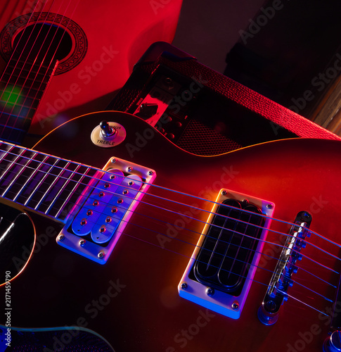Photography music concert colorful background with electric guitar acoustic guitar and ampli