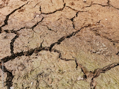 Fotografie close up of cracked ground surface due to prolonged hot weather