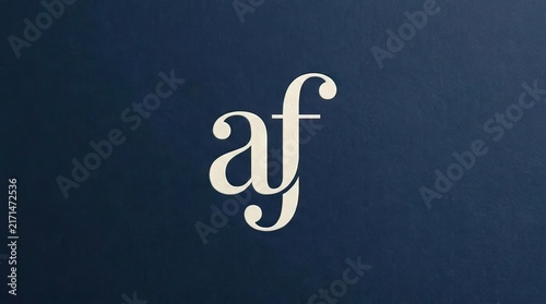 Tapety artystyczne White AF script monogram on textured blue background.
