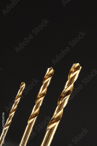 Canvastavla A Close up look of  golden shining drill bits