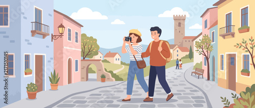 Couple walking on European cobblestone city street.