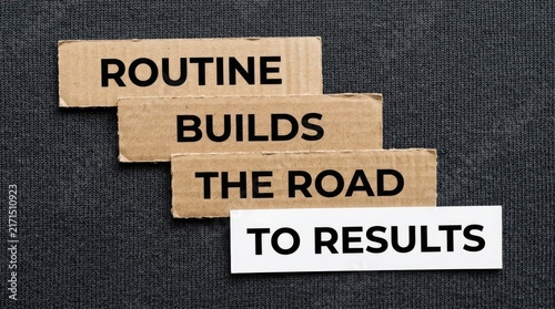 Cardboard strips with motivational words arranged to form a clear and encouraging message for daily success
