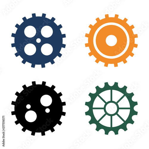 Collection of colorful mechanical gears and cogwheels in blue orange black and green with cogwheel