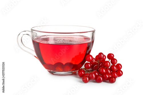 Konstfotografi Glass cup of hot viburnum tea on white background