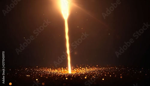 Vertical golden beam of light rising from sparkling ground