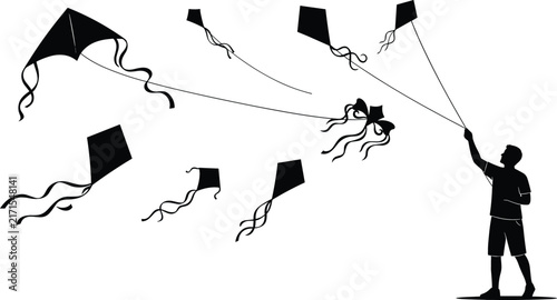 Fotografía Young man flying multiple colorful diamond kites in windy weather black silhouet