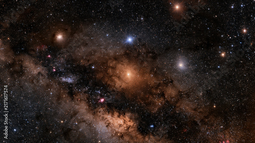 Dense star cluster in the core of a galaxy shines in warm golden light
