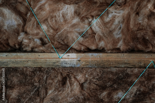 Foto Building insulation and mold on wooden beams in construction